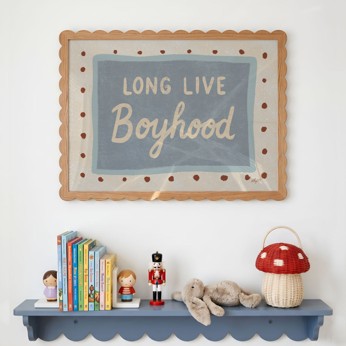 Landscape poster with the hand lettered words long live boyhood on a blue panel