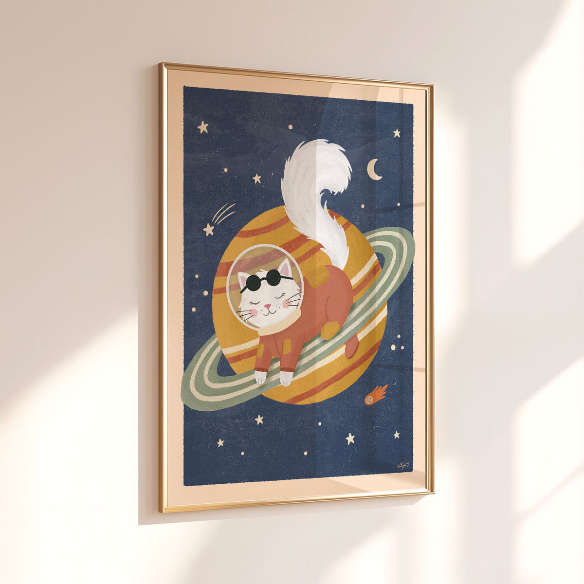 Illustrated poster of a white cat in a rust spacesuit lying on a golden ringed planet in a navy sky