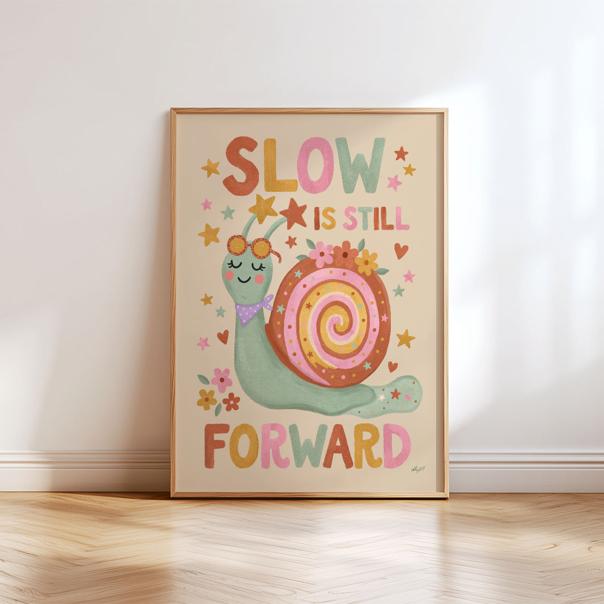 Illustrated poster of a smiling snail in sunglasses with the words slow is still forward