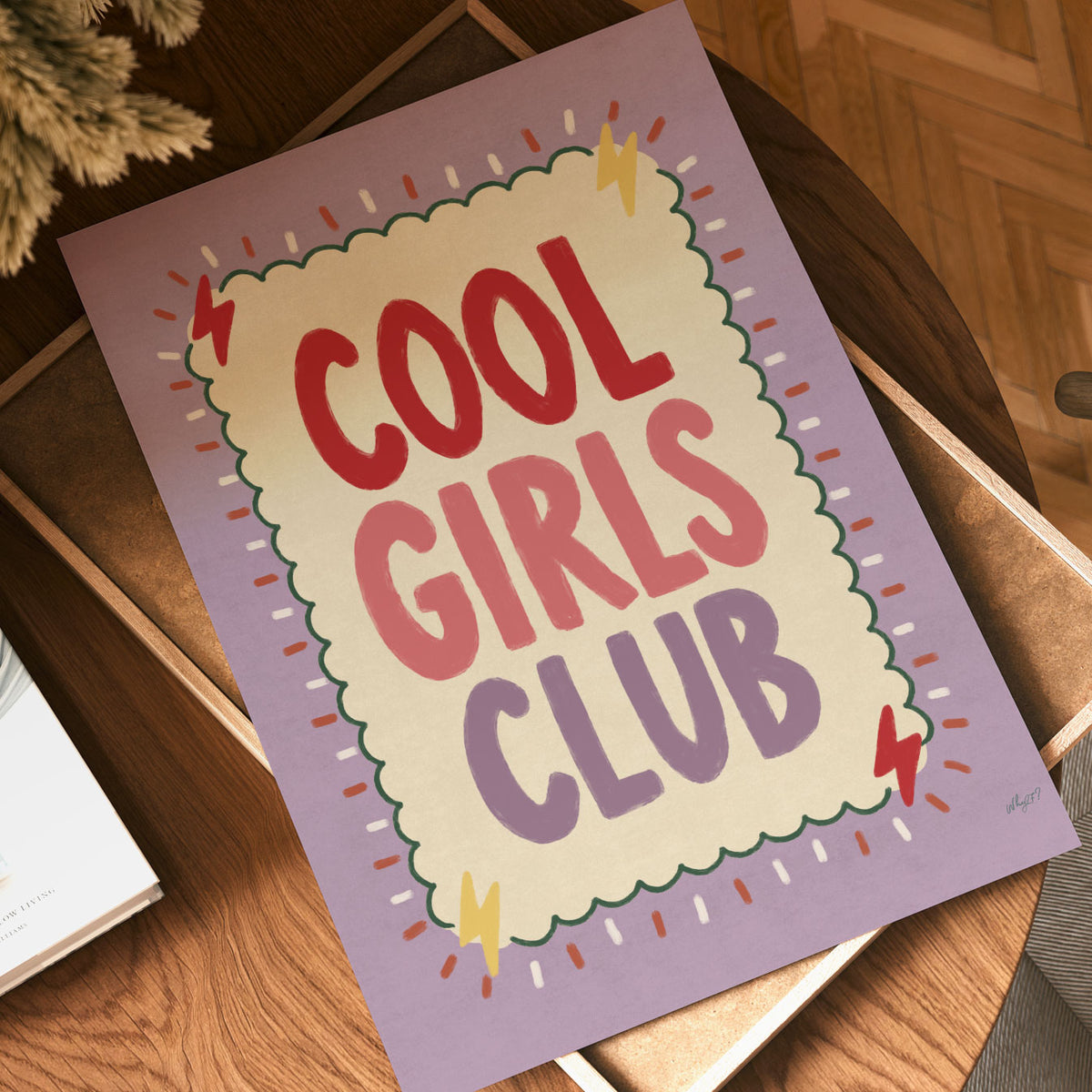 Bold hand-painted lettering reading Cool Girls Club in red, coral and lilac inside a scalloped green border on a lilac background.