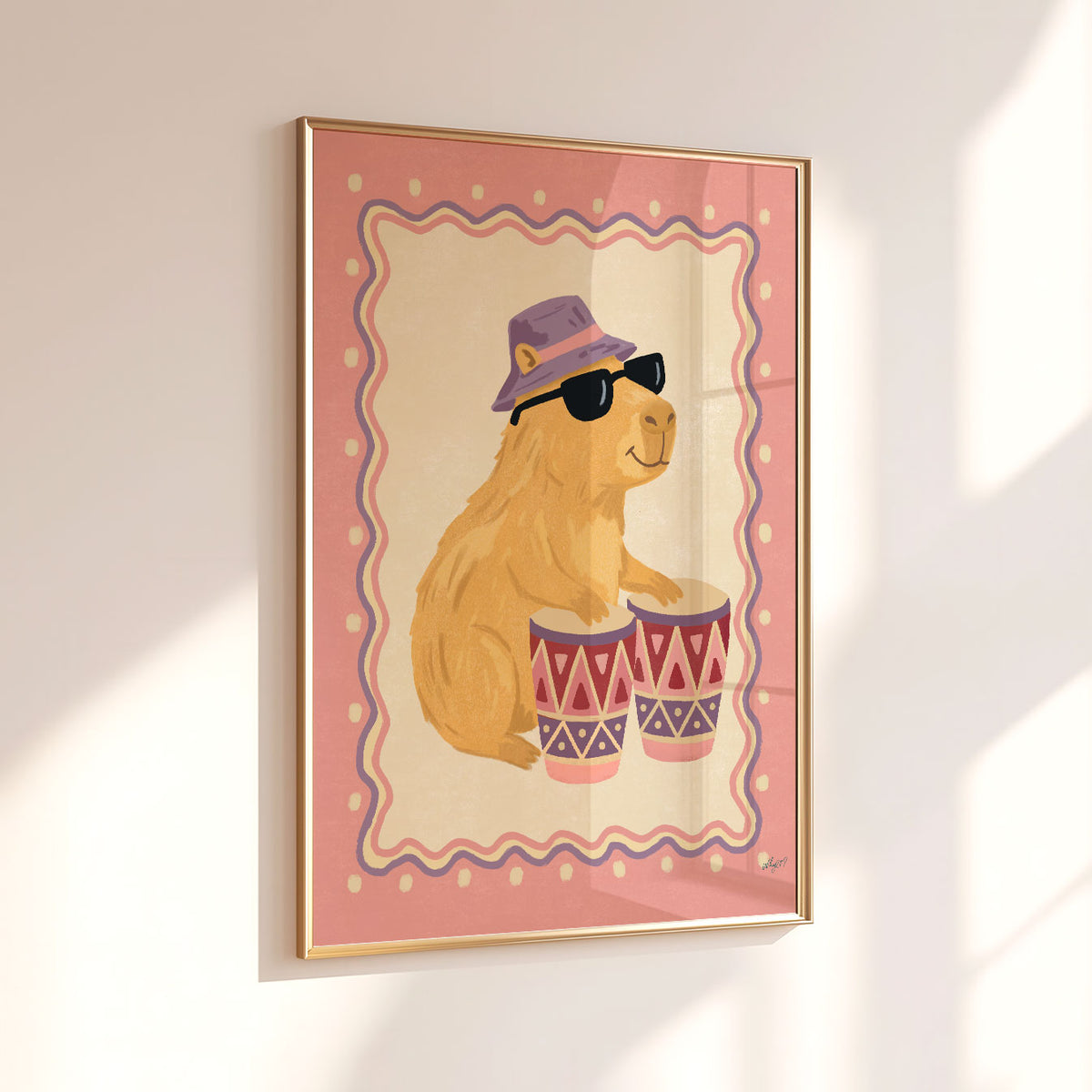 Illustrated capybara in sunglasses and a lilac bucket hat playing bongo drums, inside a wavy border on a dusty pink background.