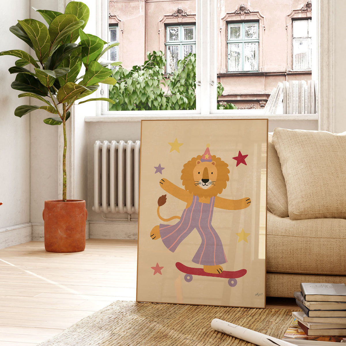 Illustrated lion wearing a party hat and lilac striped overalls riding a red skateboard surrounded by stars on a cream background.