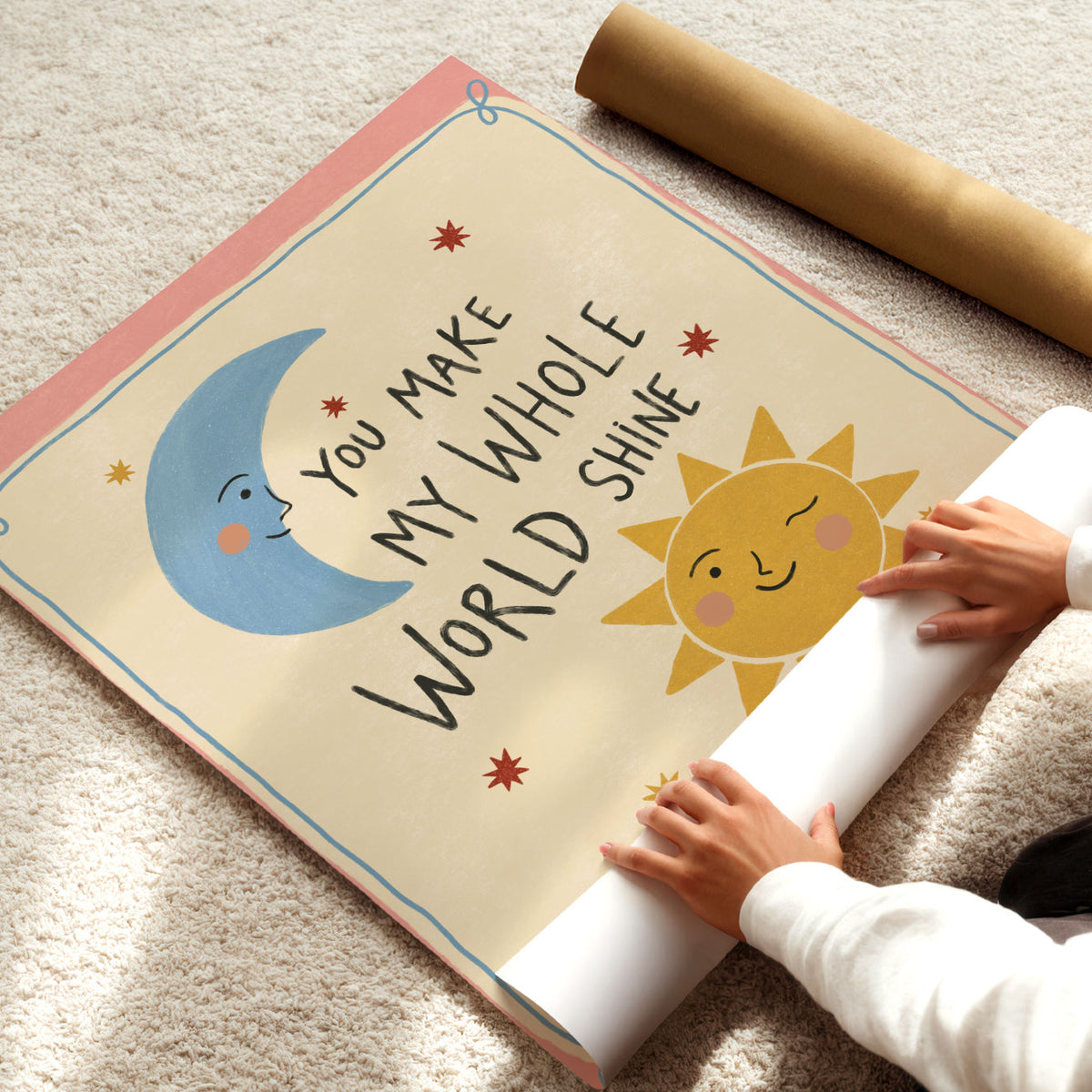 Hand-lettered quote reading You Make My Whole World Shine with a smiling sun and crescent moon, on a warm pink background.