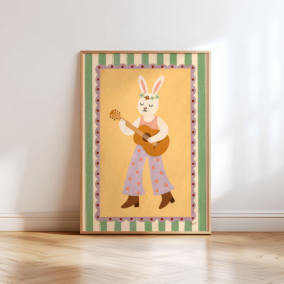 Whimsical guitar bunny poster in yellow, blue and green with starry flares and cowboy boots.