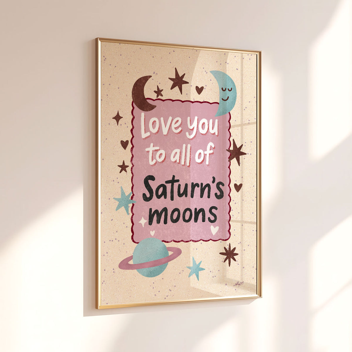 Love You to All of Saturn’s Moons wall art with retro celestial illustrations on a warm cream background.