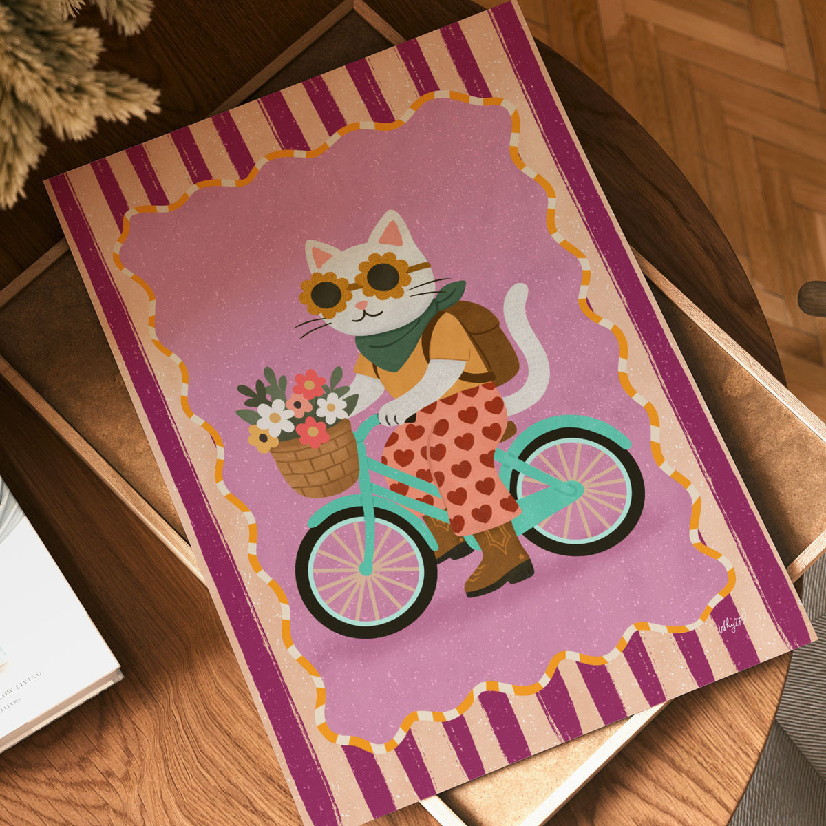 Flower bike cat kids wall art featuring a stylish cat in heart-print trousers and flower sunglasses.