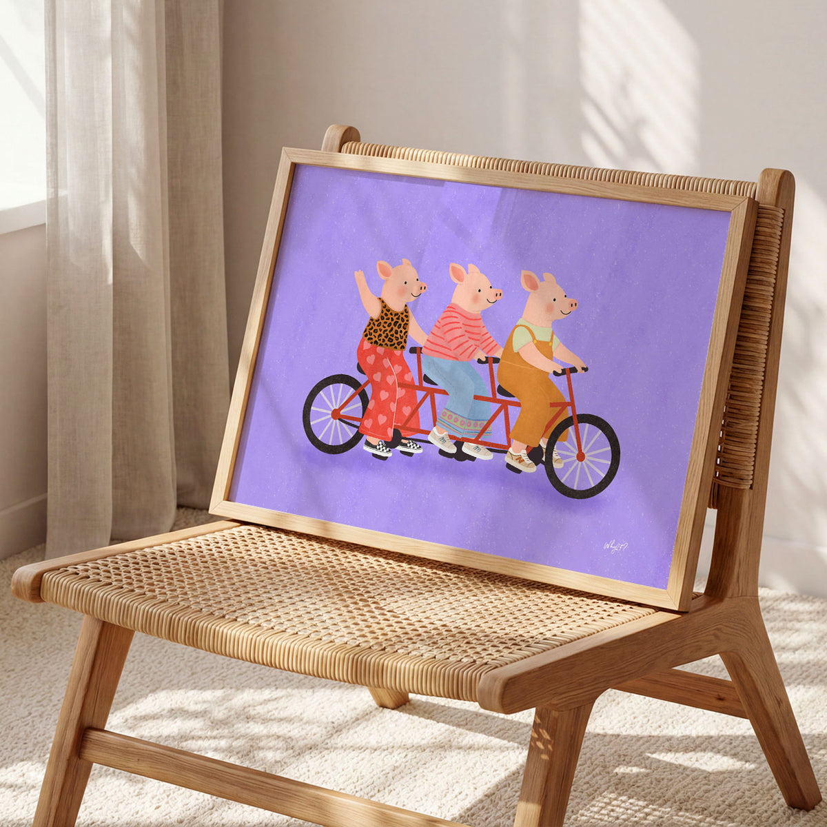 Landscape poster of three pigs riding a long red tandem bicycle on purple