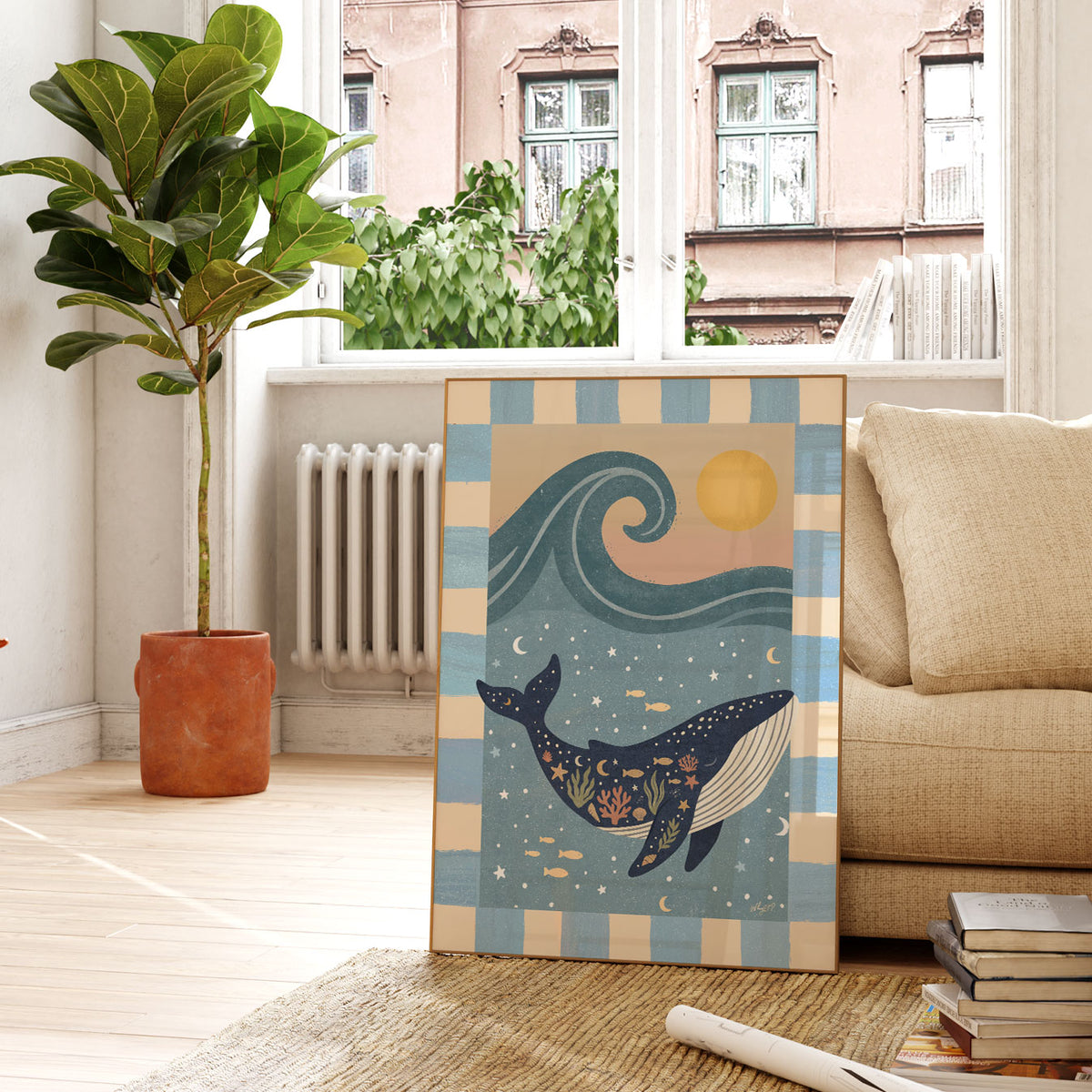 Underwater whale illustration in deep blue and cream with a curling wave and striped decorative border.