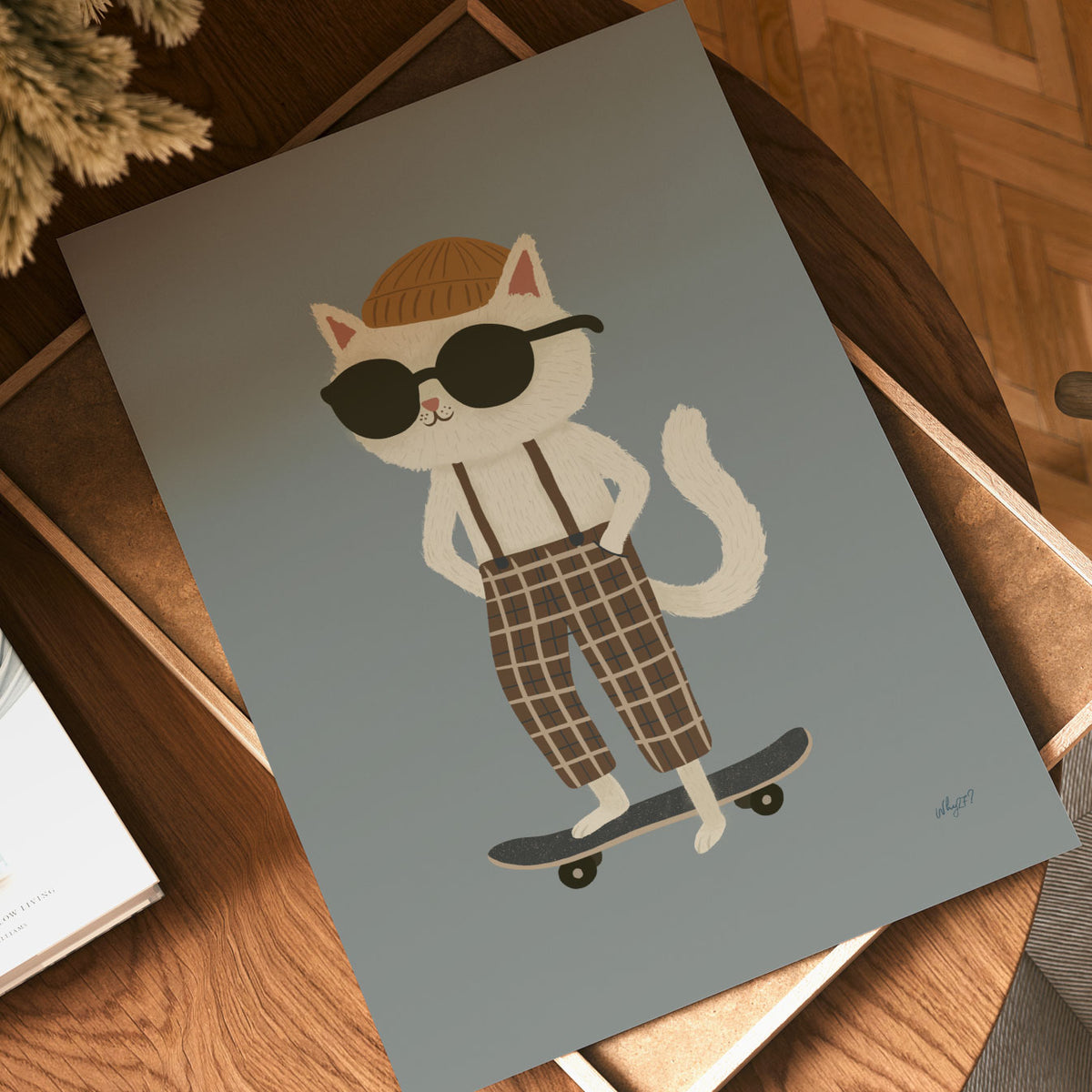 Kids skate wall art with a hand-drawn cat wearing retro checked trousers while riding a black skateboard.