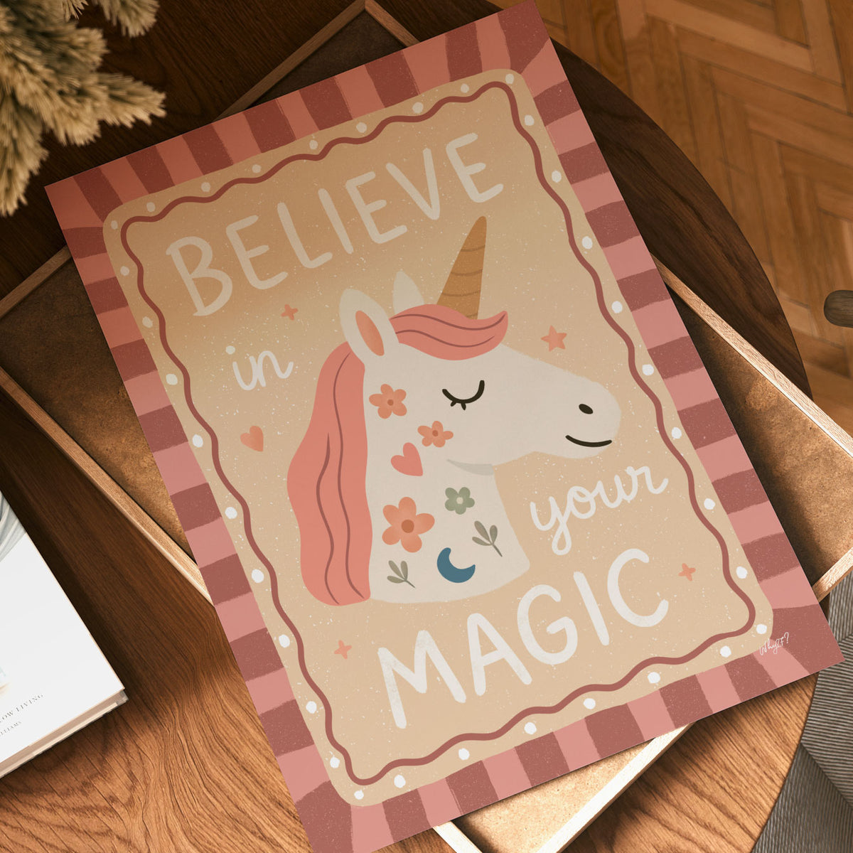 Hand-drawn unicorn poster with floral details, hearts, stars and inspirational lettering in soft pink tones.