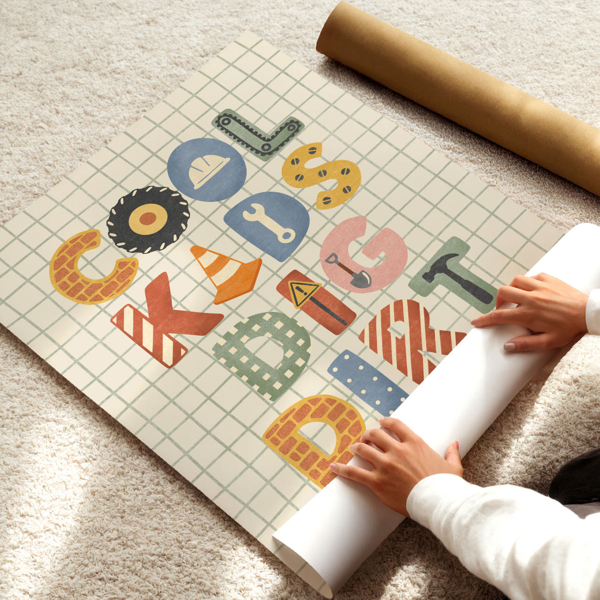 Kids construction poster featuring Cool Kids Dig Dirt and Little Builders at Work lettering on a grid background.