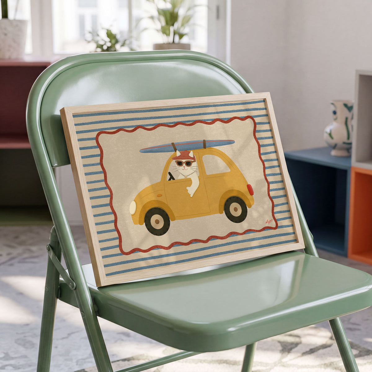 Landscape poster of a cat driving a yellow surf car on a blue and cream striped background