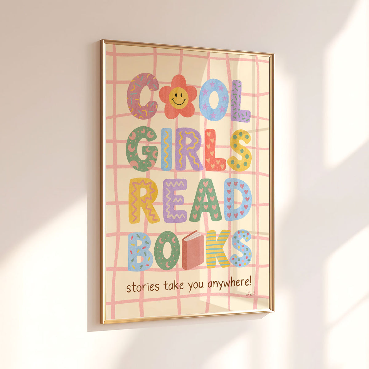 Colourful book lover poster for kids with playful typography, illustrated books and a pink grid background.
