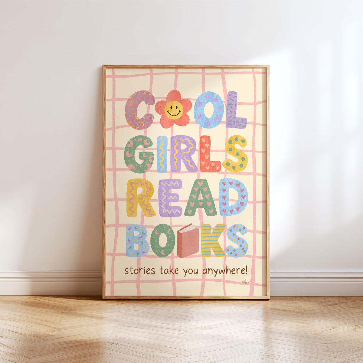 Kids reading wall art featuring Cool Girls Read Books and Stories Take You Anywhere hand-drawn lettering.