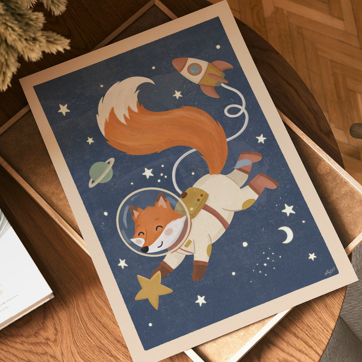 Illustrated poster of a fox in a cream spacesuit floating through a navy starry sky with a rocket and planet