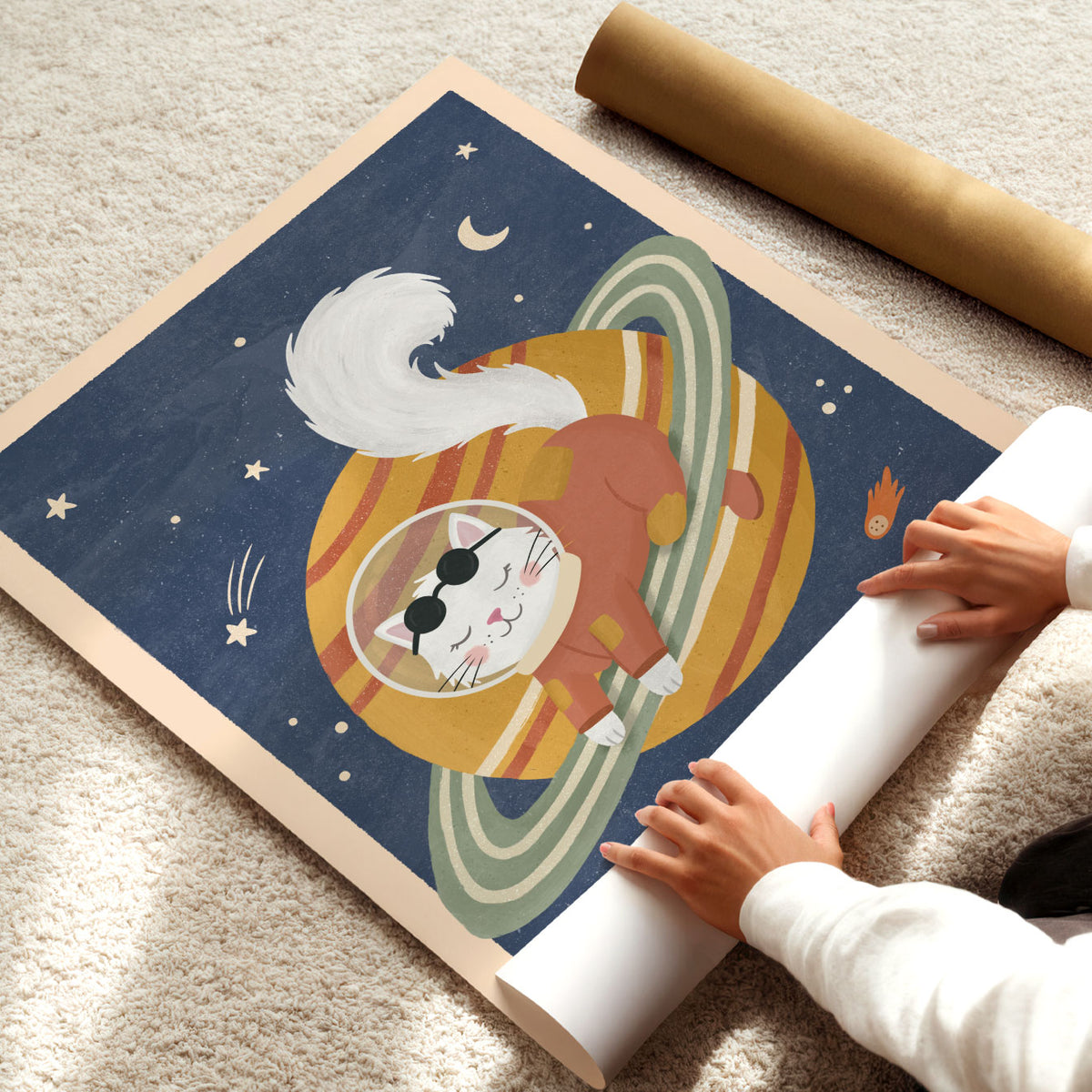 Illustrated poster of a white cat in a rust spacesuit lying on a golden ringed planet in a navy sky