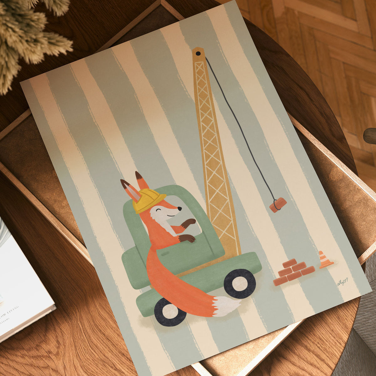 Illustrated poster of a fox in a hard hat driving a green crane lifting a brick on a striped background