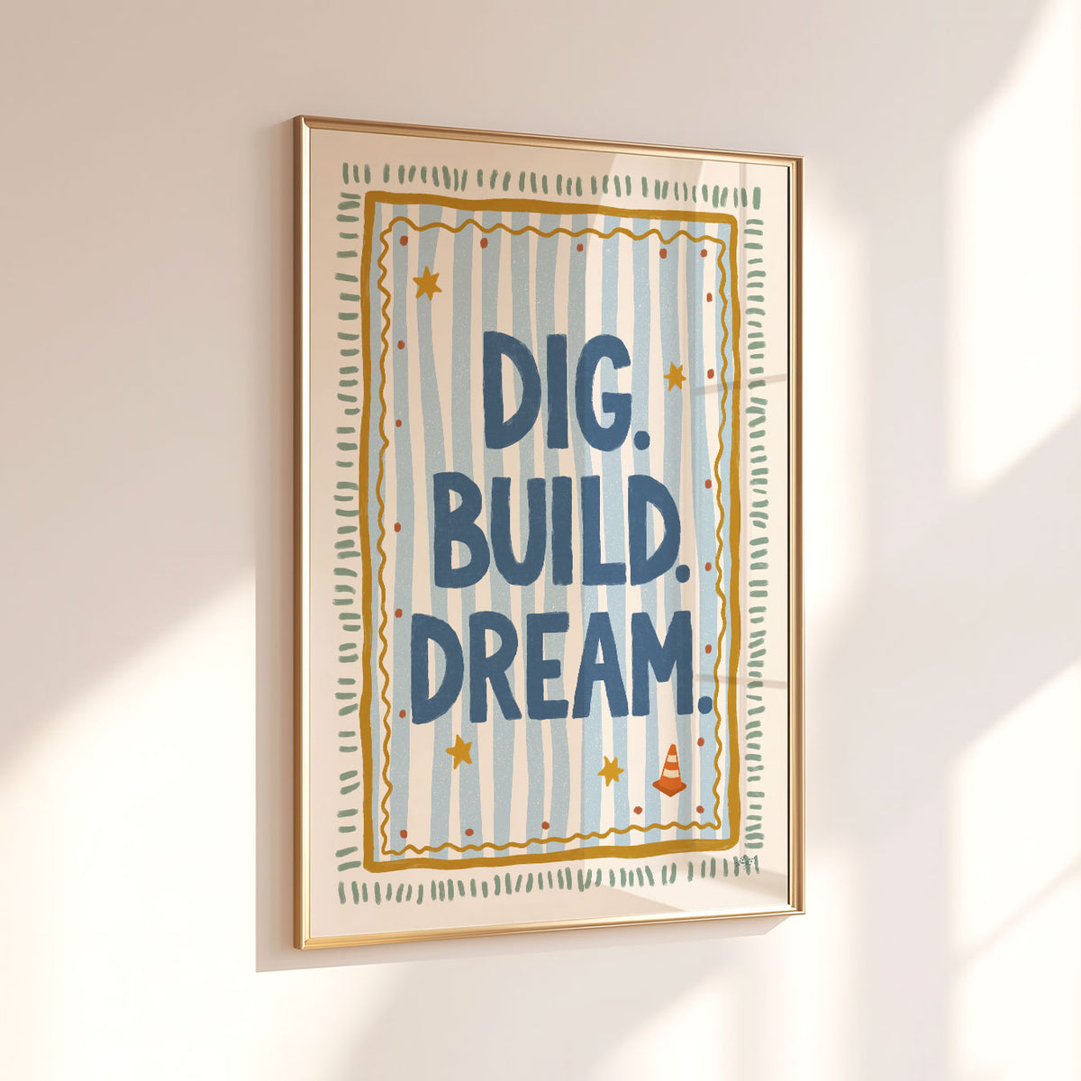 Illustrated poster with the hand lettered words dig build dream on blue stripes inside a gold frame