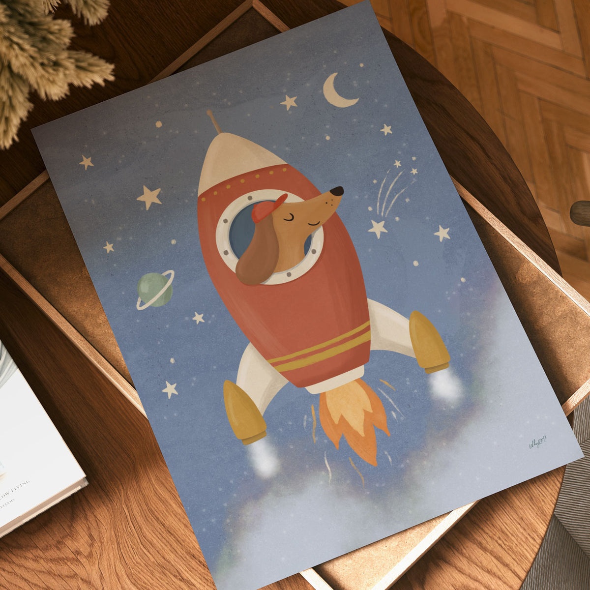 Illustrated poster of a dachshund in a red cap flying a rocket through a starry blue sky