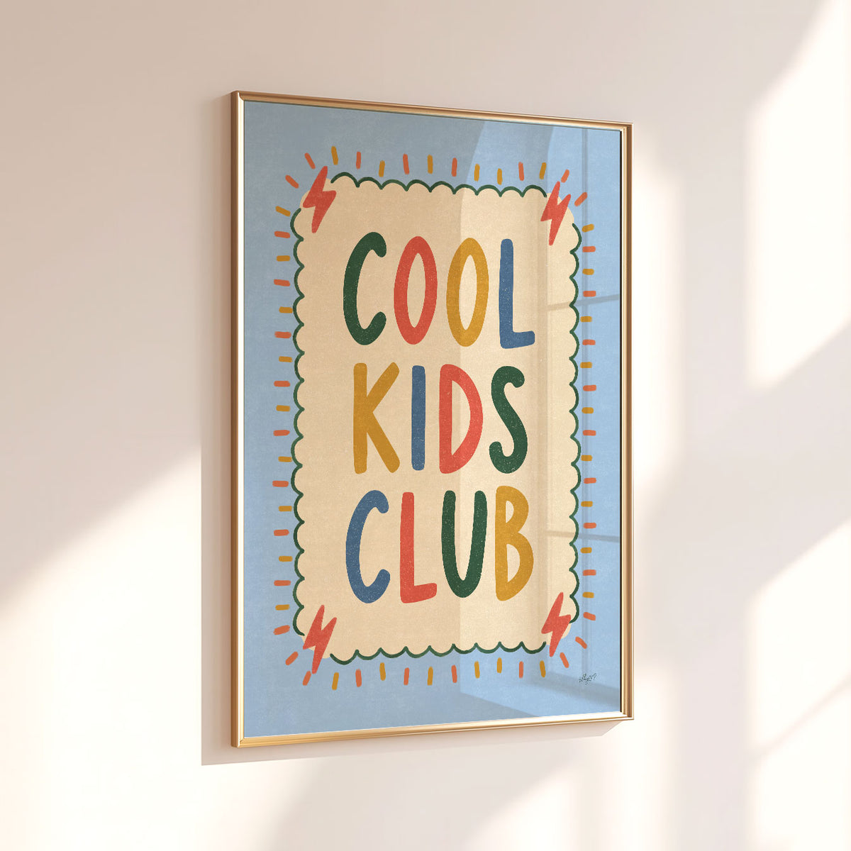 Illustrated poster with the hand lettered words cool kids club on a cream scalloped card
