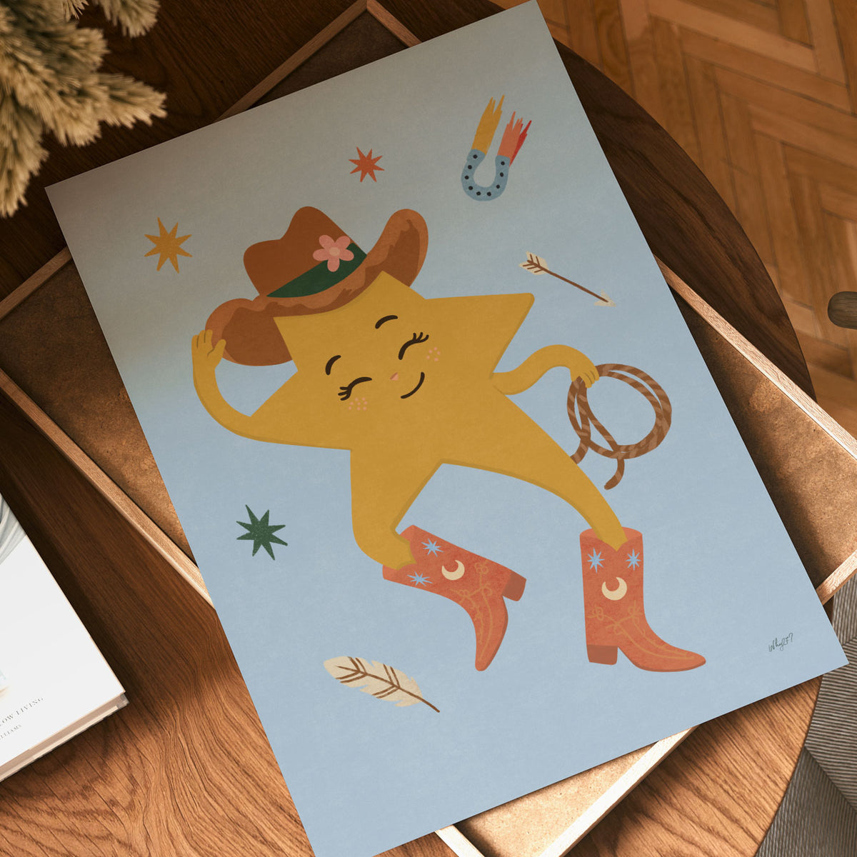 Illustrated poster of a smiling golden star in a cowboy hat and red boots holding a lasso