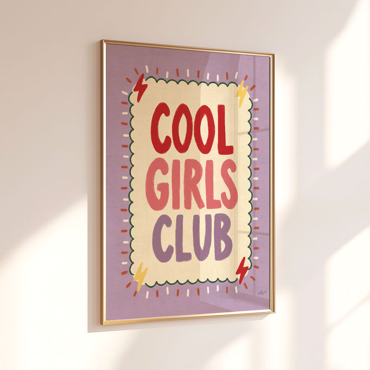 Bold hand-painted lettering reading Cool Girls Club in red, coral and lilac inside a scalloped green border on a lilac background.