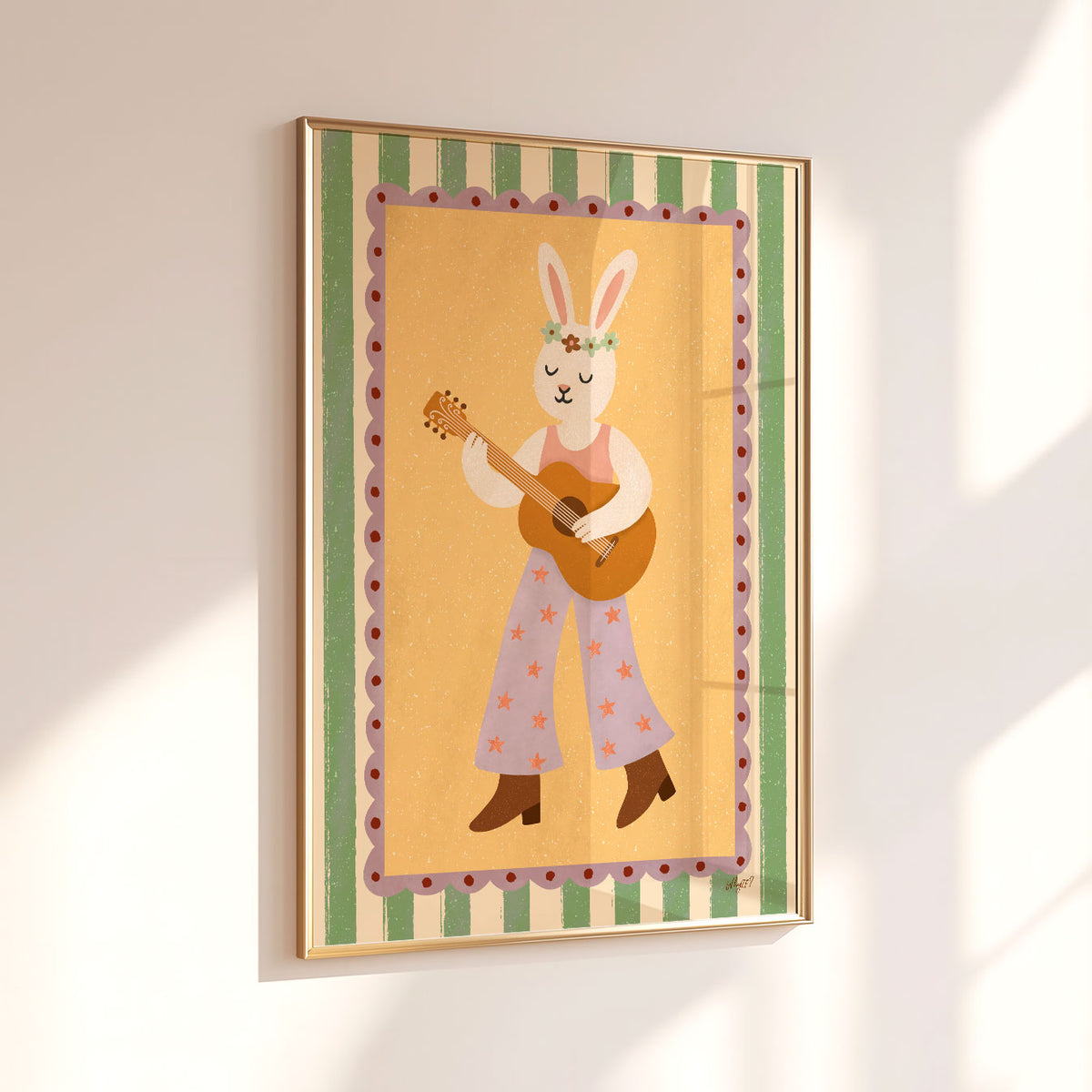 Bunny with guitar kids wall art featuring a rabbit musician on a warm yellow background with green striped border.
