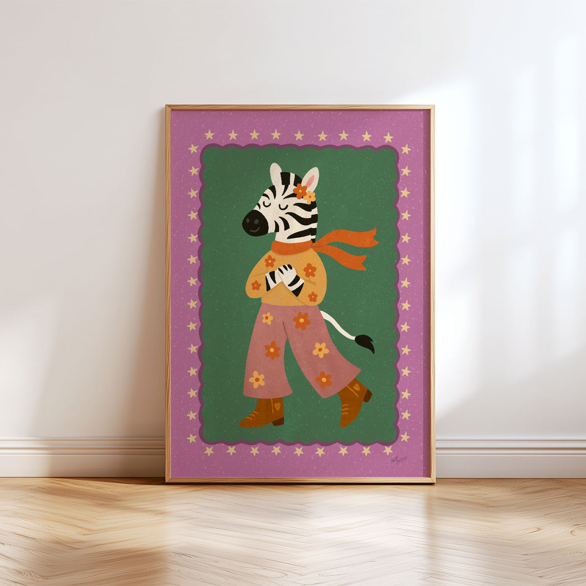 Whimsical zebra poster with floral trousers, orange scarf and boots framed by stars on a green background.