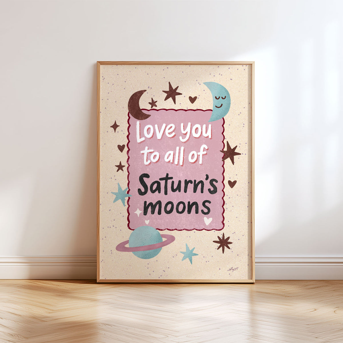 Whimsical celestial nursery wall art with Saturn, moons and stars surrounding a hand-lettered love message.
