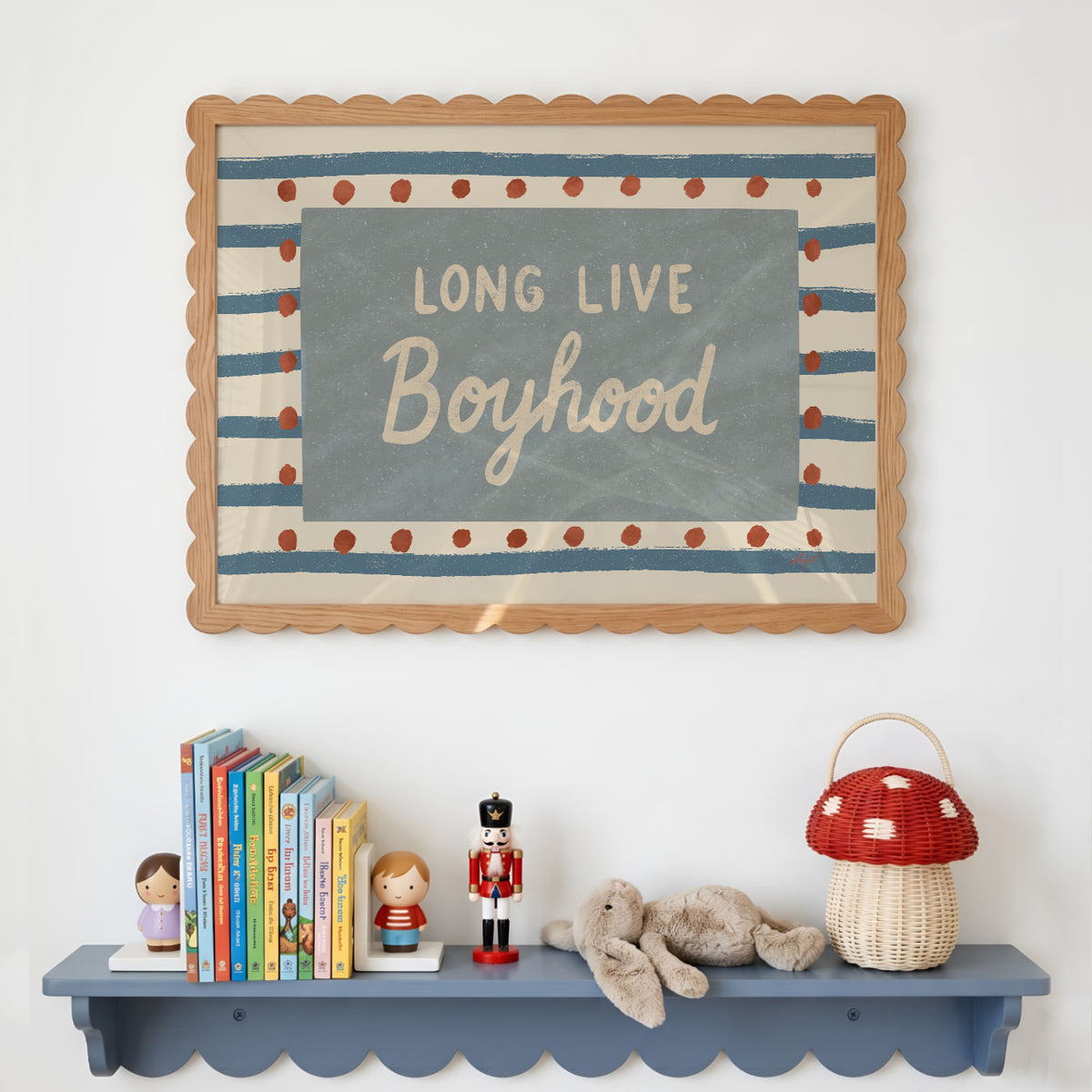 Landscape poster with the words long live boyhood on a blue panel over stripes