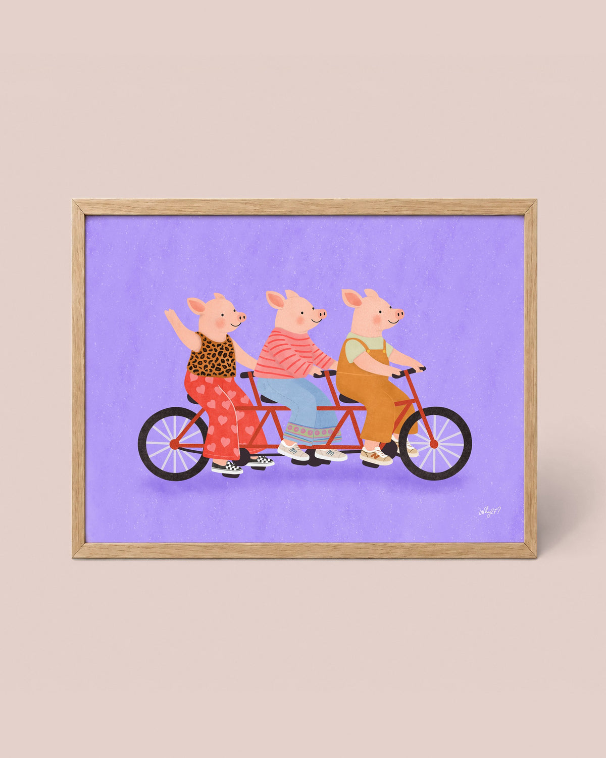Three Pigs Tandem Bike Poster framed in a natural wood frame