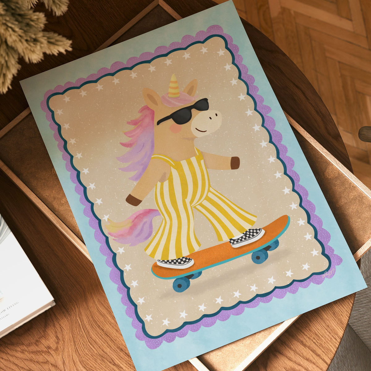Hand-drawn skateboarding unicorn with pink mane and tail, yellow striped outfit and black sunglasses.