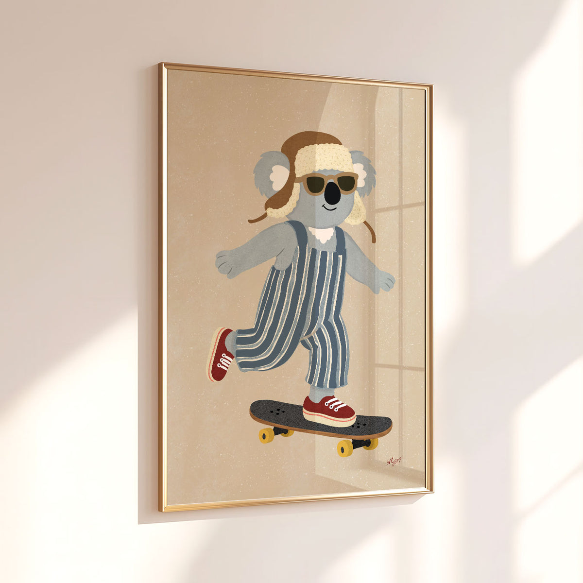 Kids skateboard wall art featuring a hand-drawn koala cruising in sunglasses and vintage-style overalls.