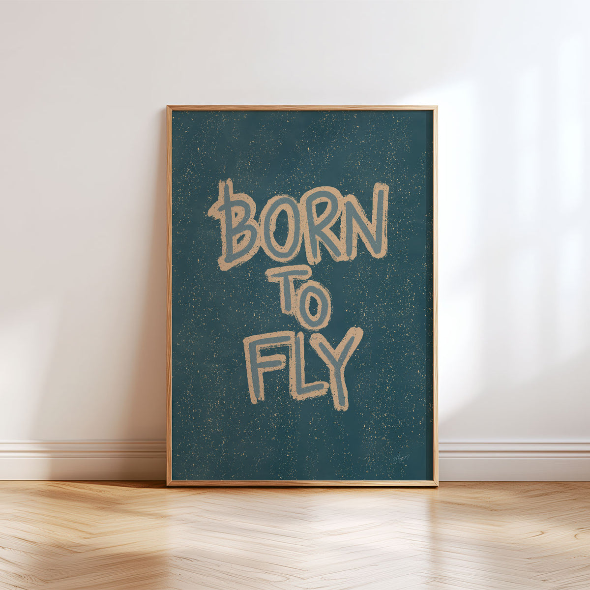 Hand-drawn Born to Fly typography poster with cream lettering and a deep blue-green background.