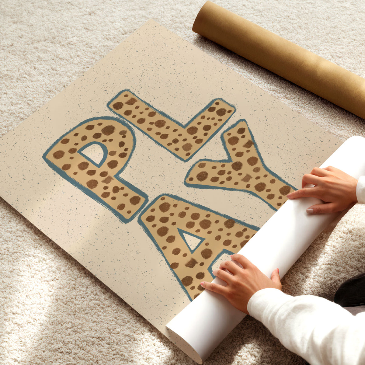 Hand-drawn PLAY poster with oversized spotted typography outlined in muted blue.