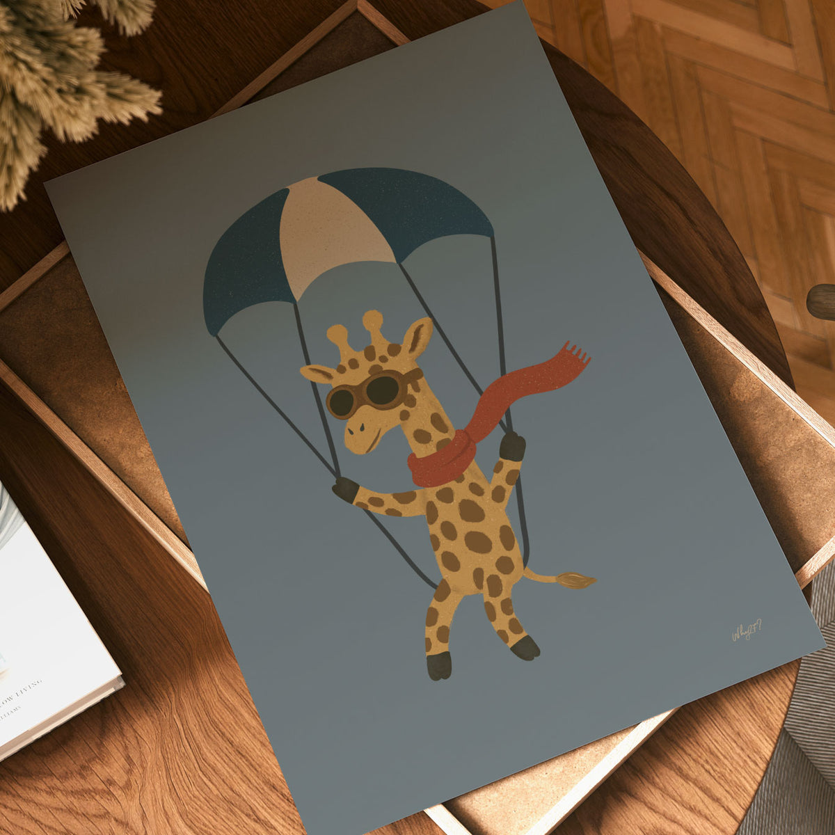 Kids adventure wall art featuring a hand-drawn giraffe hanging beneath a striped parachute.