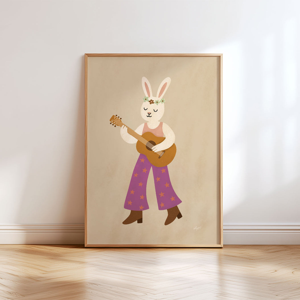 Guitar bunny kids wall art featuring a white rabbit musician in retro purple flares on a warm beige background.