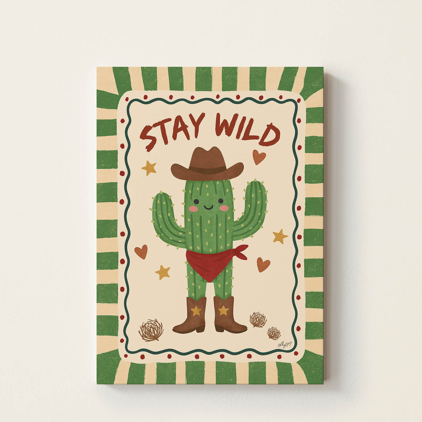 Hand-drawn smiling cactus wearing a cowboy hat, boots, and a bandana with the words "Stay Wild", retro-inspired desert wall art for nurseries, bedrooms, playrooms, and children's rooms.